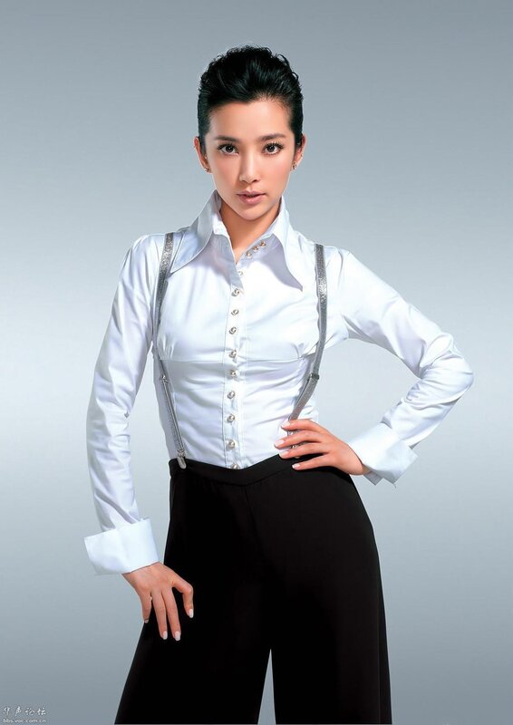 woman in white shirt and suspenders
