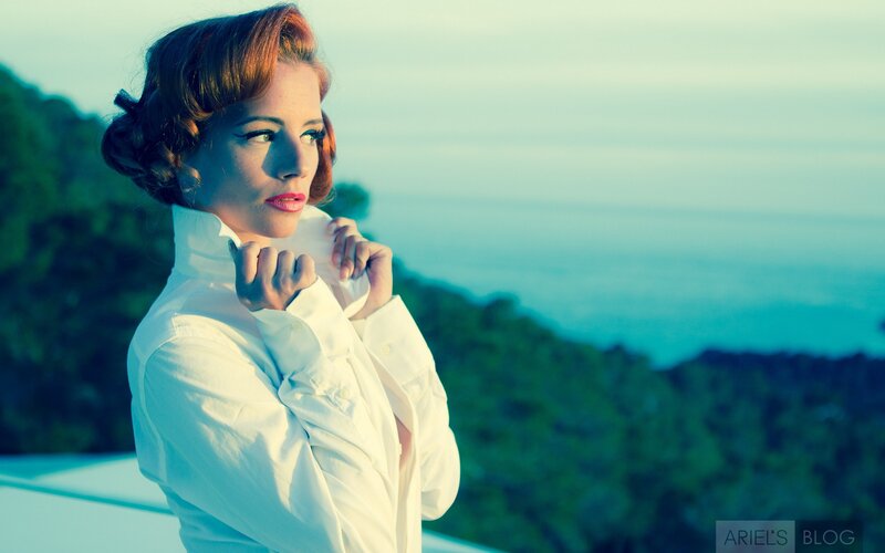 woman in white shirt by the sea