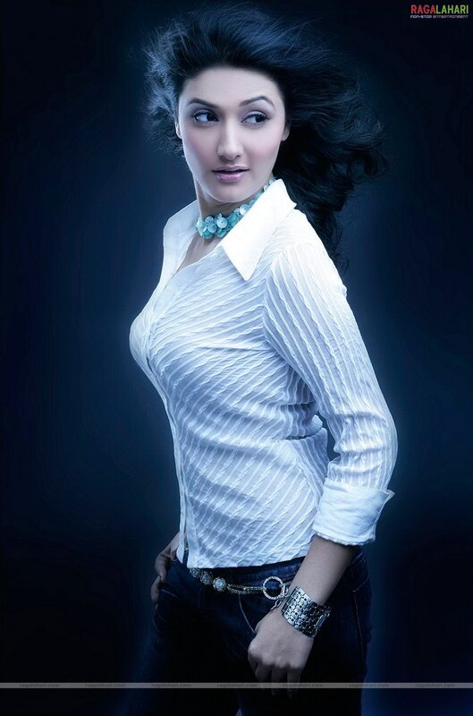 Woman in White Shirt — Dramatic, Photograph, Necklace, Jeans