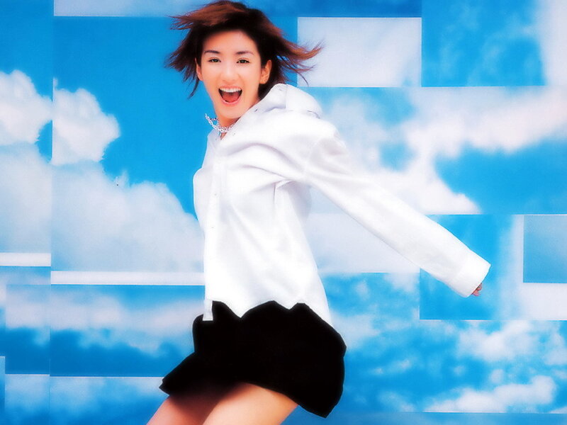 woman in white shirt jumping