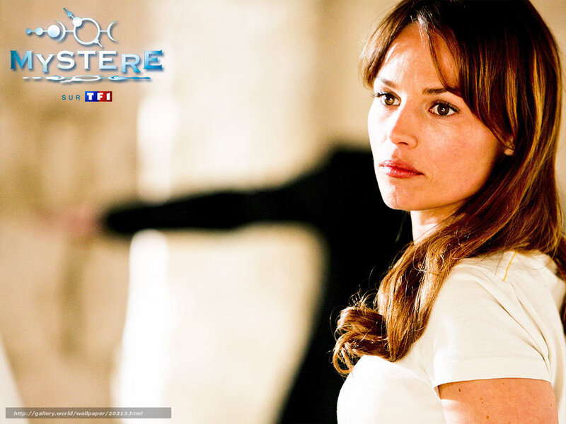 woman in white shirt looking back