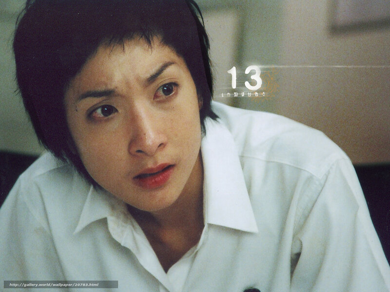 woman in white shirt looking concerned