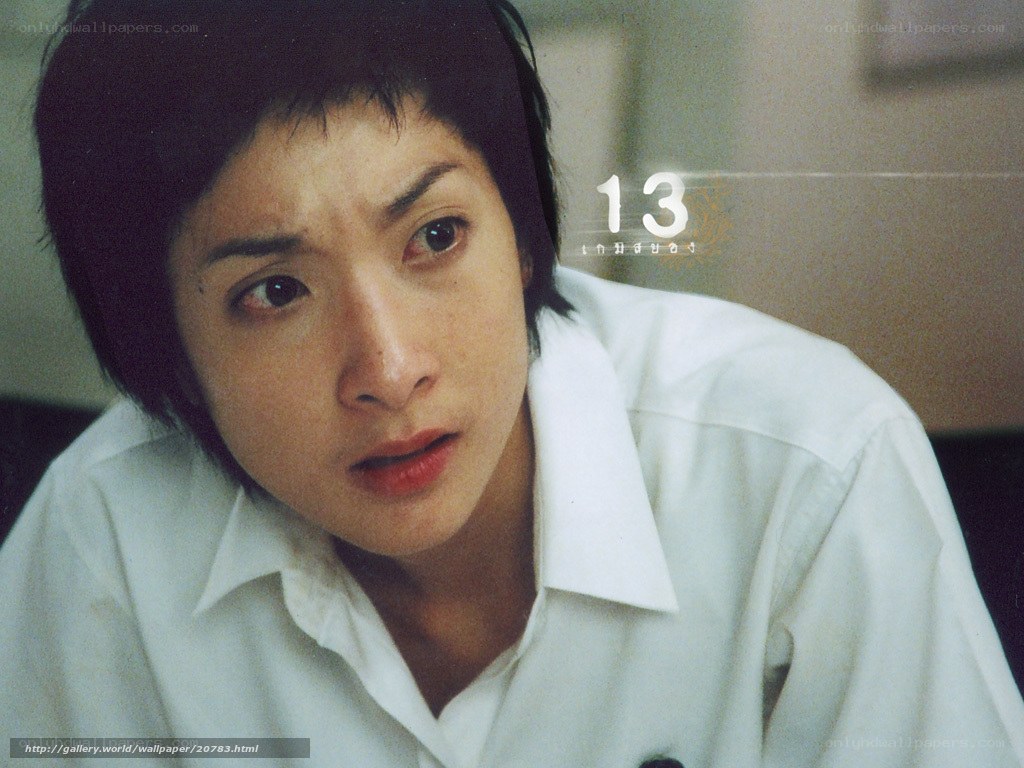 woman in white shirt looking concerned