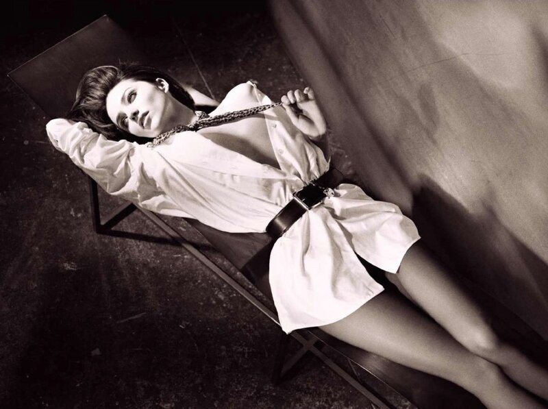 woman in white shirt lying down