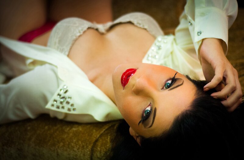 woman in white shirt lying down