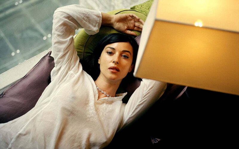 woman in white shirt lying down