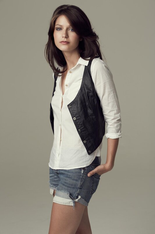 Woman in White Shirt — Neutral, Photograph, Vest, Shorts