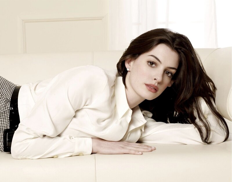 woman in white shirt on couch