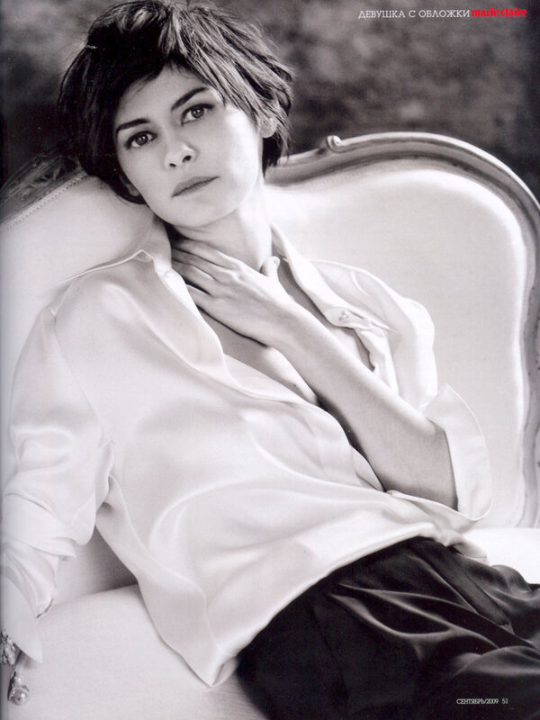 woman in white shirt on couch