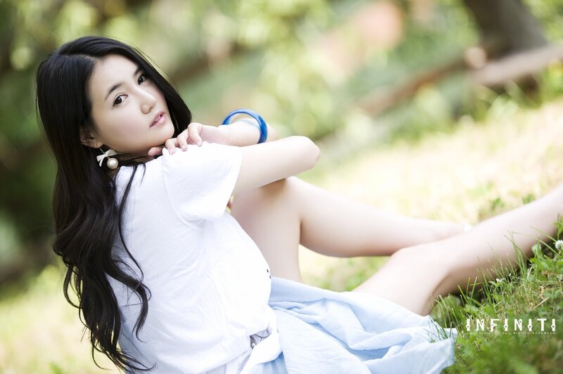 woman in white shirt on grass