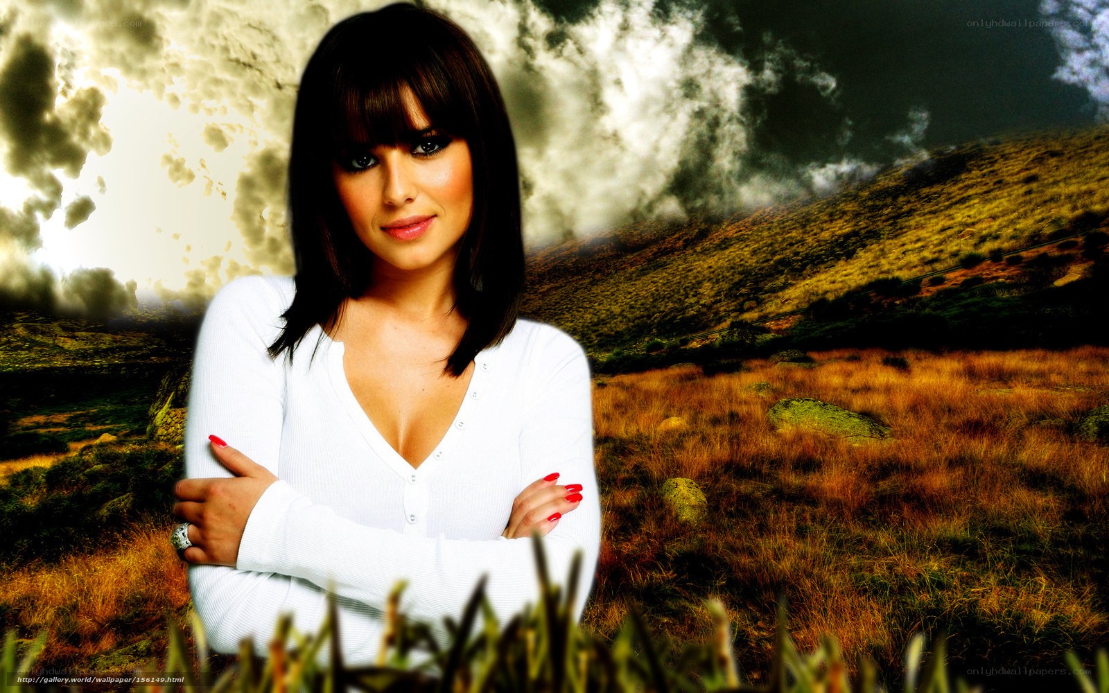 Woman in white shirt on hillside