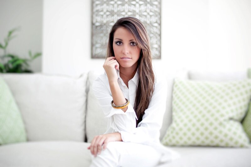 woman in white shirt on sofa