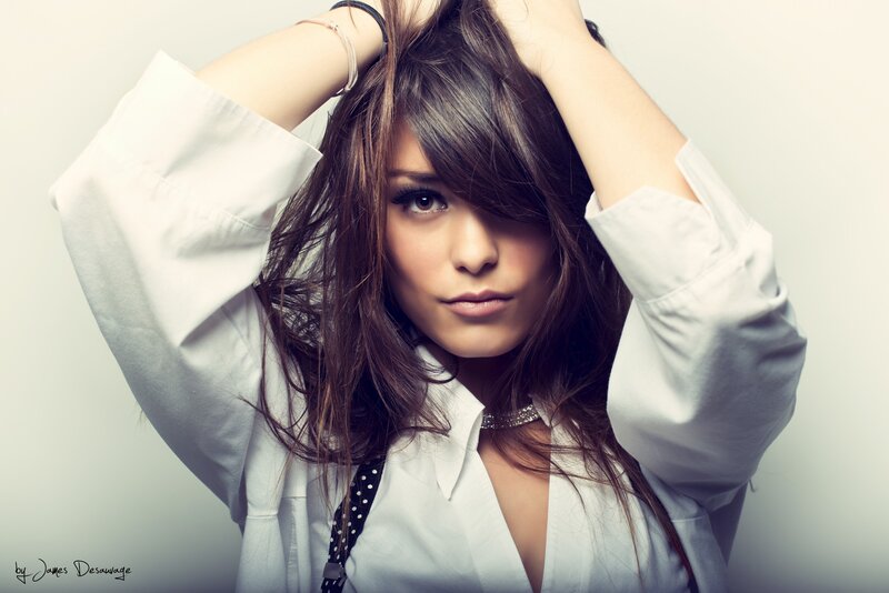 woman in white shirt posing