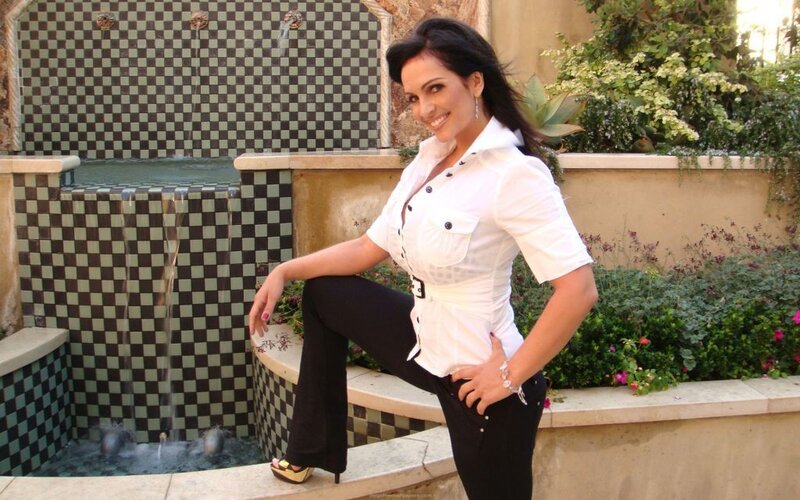 Woman in White Shirt — Relaxed, Afternoon, Photograph, Fountain