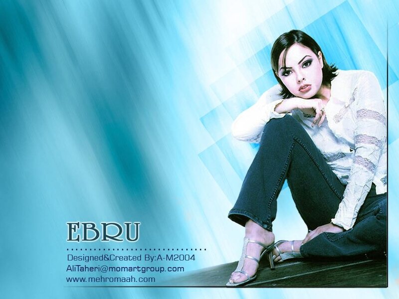 woman in white shirt sitting