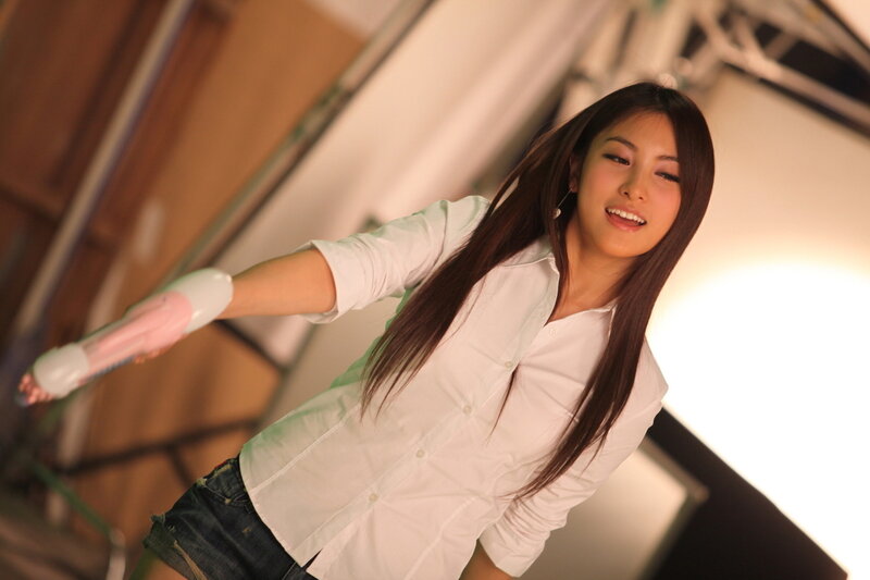 woman in white shirt smiling