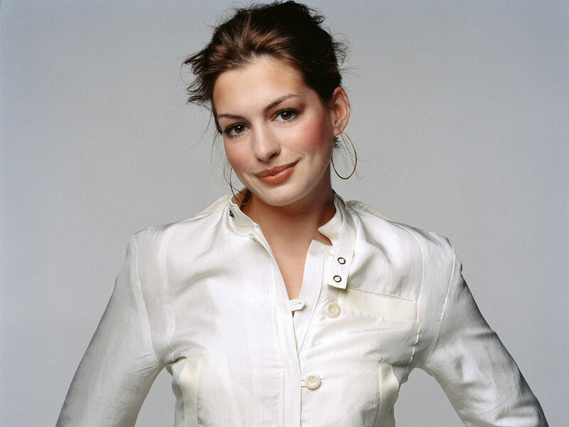 woman in white shirt smiling