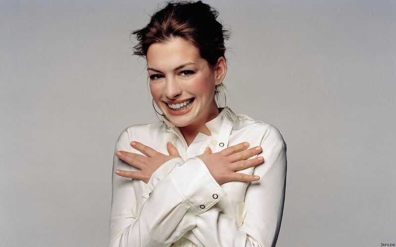 woman in white shirt smiling