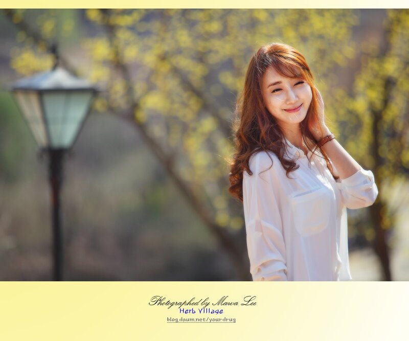 woman in white shirt smiling