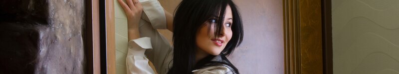 woman in white shirt smiling