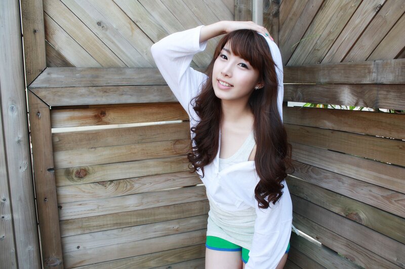 woman in white shirt smiling