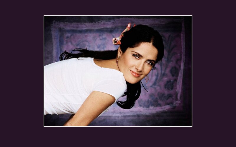 woman in white shirt smiling