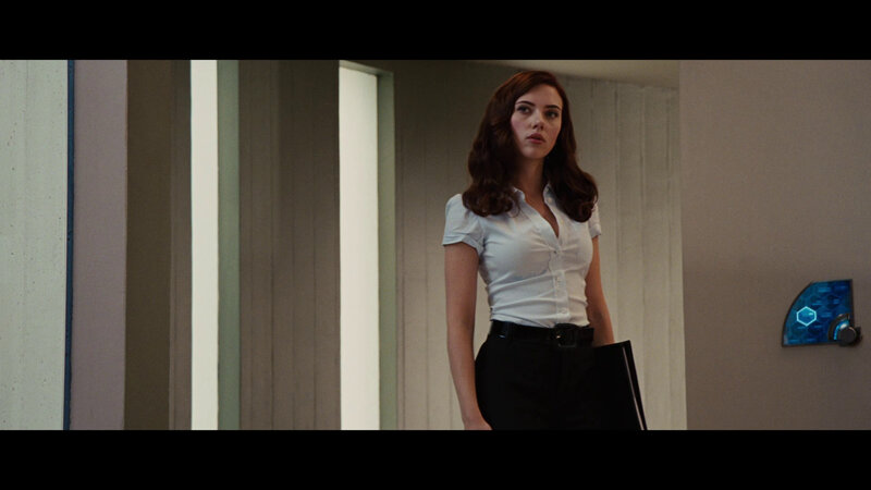 woman in white shirt standing