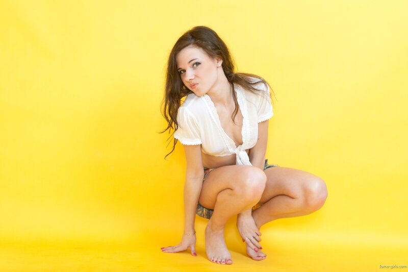 Woman in White Shirt — Yellow, Playful, Photograph
