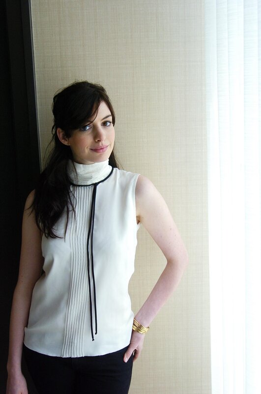 woman in white sleeveless top