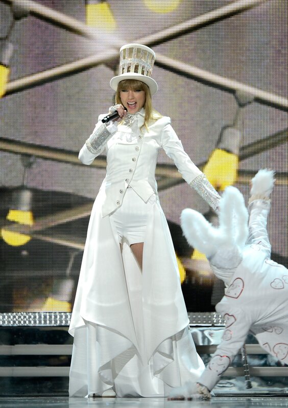 Woman in White Suit — Performative
