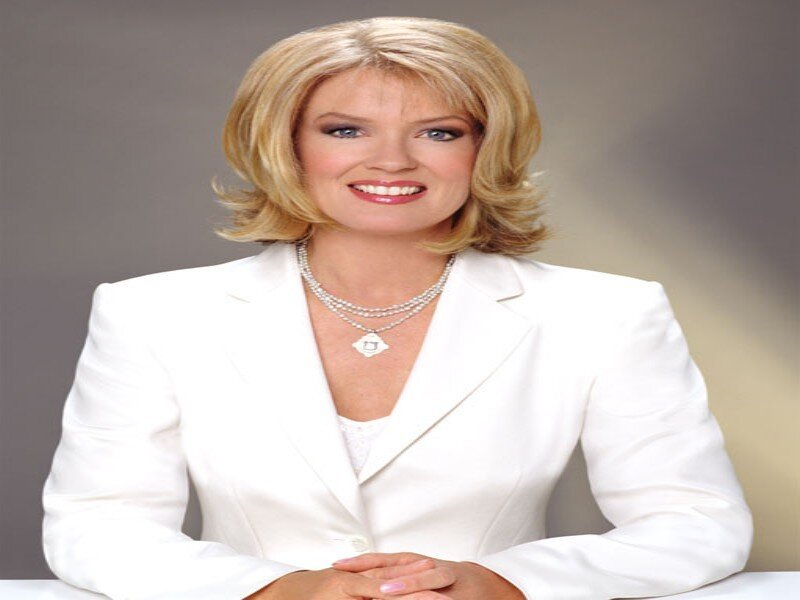 Woman in White Suit — Professional