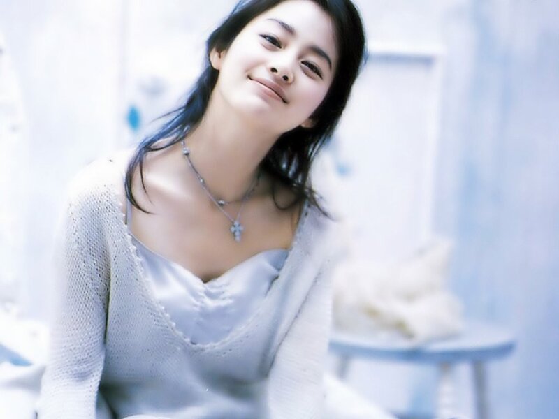 woman in white sweater
