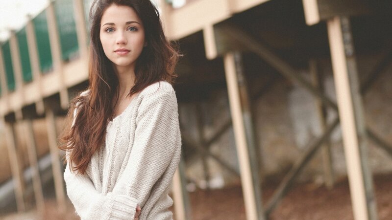 woman in white sweater
