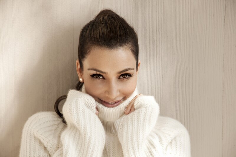 woman in white sweater