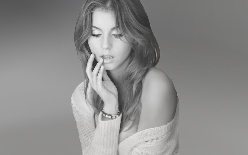 woman in white sweater