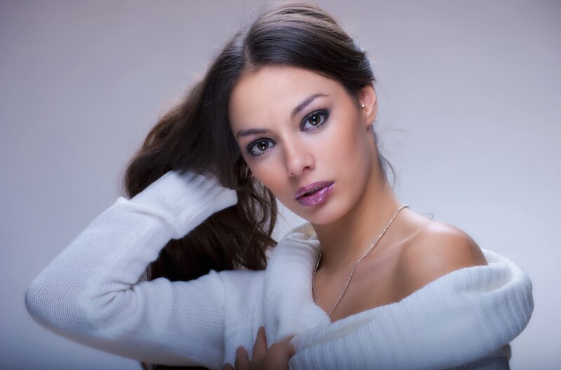 woman in white sweater