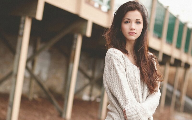 woman in white sweater
