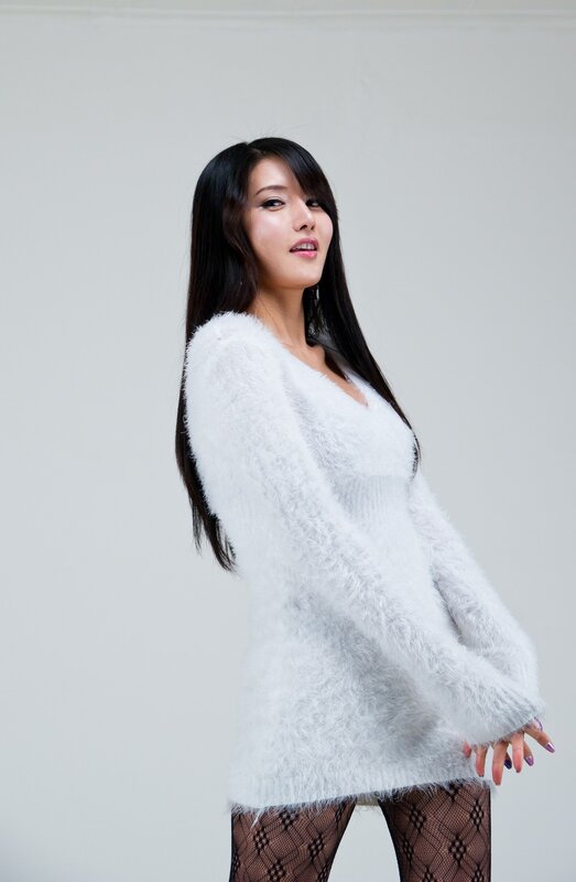 woman in white sweater