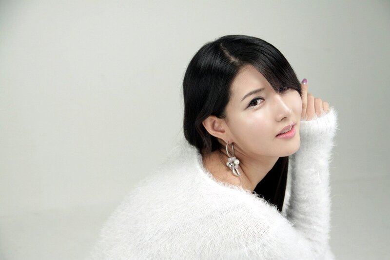 woman in white sweater