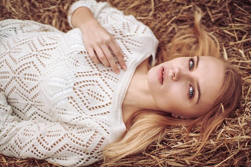 Woman in White Sweater — Calm, Afternoon, Photograph, Straw