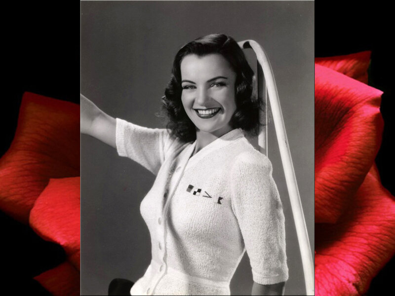 Woman in White Sweater — Cheerful