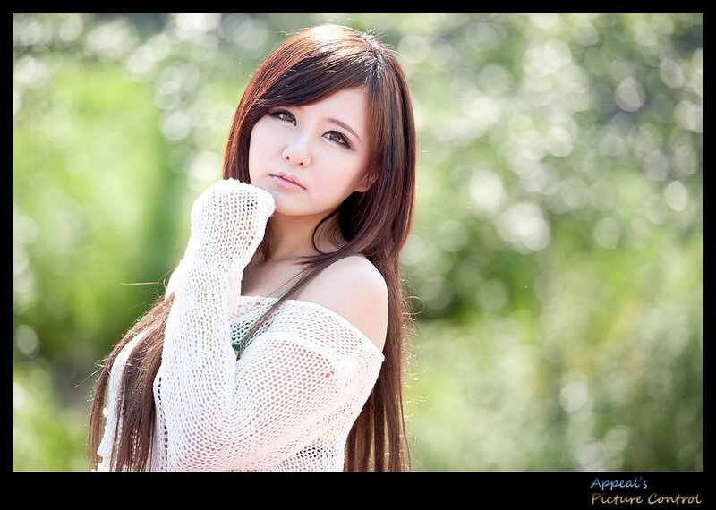 woman in white sweater outdoors
