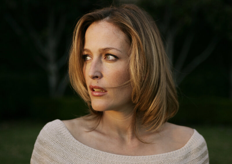 woman in white sweater outdoors