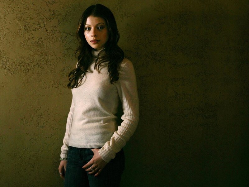 Woman in White Sweater — Serious