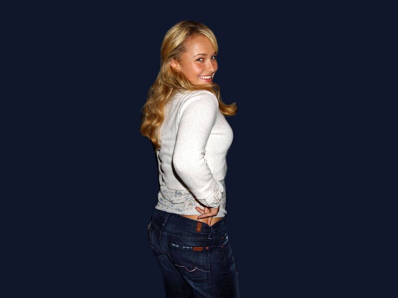 woman in white sweater smiling