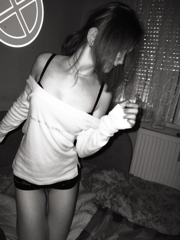 woman in white sweatshirt
