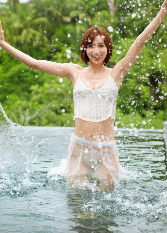 woman in white swimsuit at pool