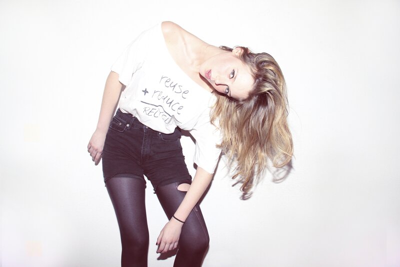 woman in white t-shirt and black shorts
