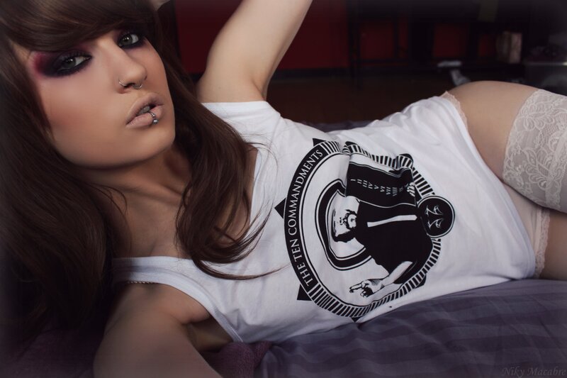woman in white t-shirt lying down