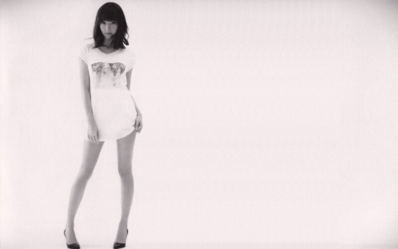 Woman in White T-shirt — Neutral, Photograph, High Heels